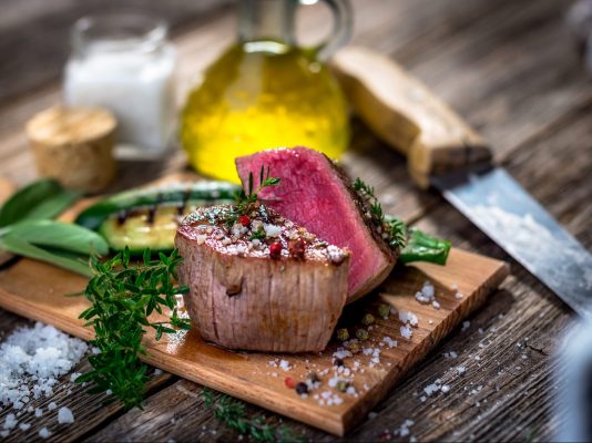 polandshiok.sg Grilled beef steak  on wooden cutting board